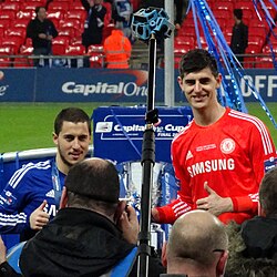 Hazard (left) holding the trophy after Chelsea's victory in the 2015 Football League Cup final