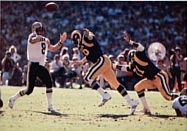 Archie Manning, pictured attempting a pass in 1980, was one of the first players to be inducted into the Saints' Ring of Honor.