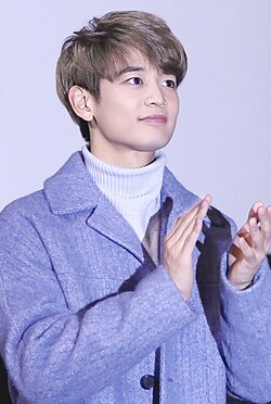 Choi at the press conference for the movie Derailed in November 2016