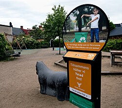 Holder for waste bags at a playground in central Ystad 2020, an initiative of the municipality to stop littering in public places.