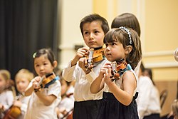 NEC Preparatory School violinists perform in NEC's Brown Hall.