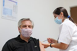 Fernández receiving the first dose of the Sputnik V vaccine against COVID-19 on 21 January 2021