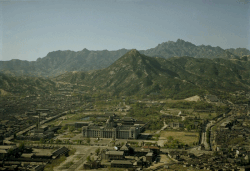 Central Seoul with the Capitol building and Gyeongbokgung palace and Hill 338 behind it