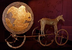 The gilded side of the Trundholm sun chariot.