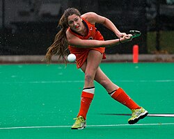 A Virginia Cavaliers field player passing the ball