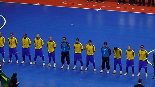 The Brazil national futsal team line up before a match.