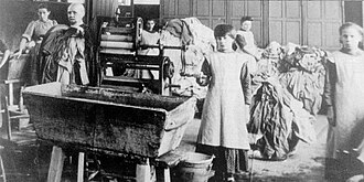 Magdalene laundries were institutions that existed from the 18th to the late 20th centuries, throughout Europe and North America, where "fallen women", including unmarried mothers, were detained. Photo: Magdalene laundry in Ireland, ca. early twentieth century.[98]