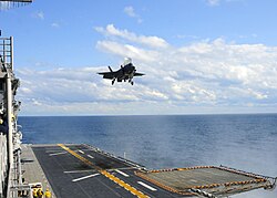 A Marine Corps F-35B, the vertical-landing version of the F-35 Lightning II multirole fighter landing aboard USS Wasp