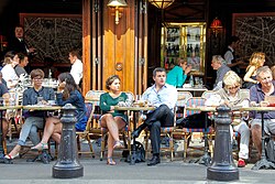 Customers looking out from a Parisian café