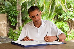 Obama signing the James Zadroga 9/11 Health and Compensation Act on January 2, 2011.