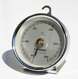 Bi-metallic thermometer for cooking and baking in an oven