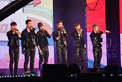 2PM performing at the Cyworld Dream Music Festival, July 2011