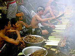 Humans preparing a meal in Bali, Indonesia