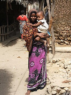 A woman in Kenya wearing kanga