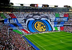 "...and now together we crown the dream!" Inter supporters during the 2010 UEFA Champions League Final at Santiago Bernabéu. In winning the final, Inter became the first and only Italian team to win the treble.