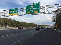 Before 2018, I-95 northbound abruptly became I-295 southbound in Lawrence Township. Signage directed drivers to continue south on I-295 and east on I-195 to reach I-95 northbound (New Jersey Turnpike).