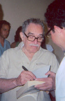 García Márquez signing a copy of One Hundred Years of Solitude in Havana, Cuba