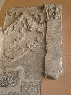Roman axes in an ancient Roman relief in Brescia, Italy