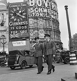 Guinness slogan in 1942, Piccadilly Circus, London. The neon sign was in place from the 1930s until the early 1980s.