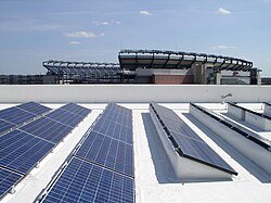 2009 Energy Project Award Winning 525 kilowatt BIPV CoolPly system manufactured by SolarFrameWorks, Co. on the Patriot Place Complex Adjacent to the Gillette Stadium in Foxborough, MA. System is installed on single-ply roofing membrane on a flat roof using no roof penetrations.