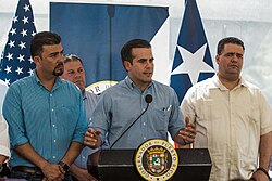 Rosselló (center) speaks in Utuado, Puerto Rico in March 2018.