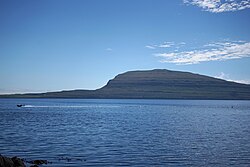 Eggjarklettur hill on Nólsoy, as seen from Tórshavn.