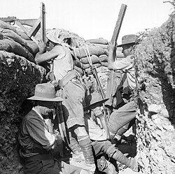 Australian light horseman using a periscope rifle, Gallipoli 1915