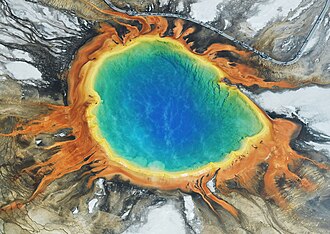 Thermophiles produce some of the bright colors of Grand Prismatic Spring, Yellowstone National Park