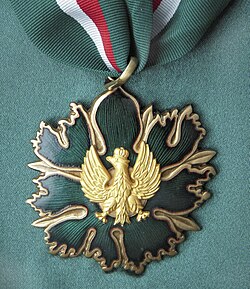 Gold Medal of Gloria Artis.