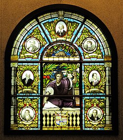 Stained glass at Ottawa Public Library featuring luminaries of English literature