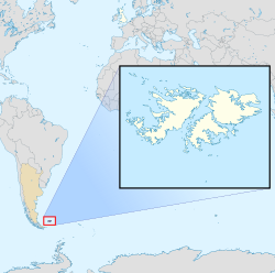 Location of the Falkland Islands (red and white), alongside the United Kingdom (white), with Argentina (beige) claiming them.