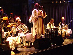 Singer-songwriter Omer Ihsas & his Peace Messengers from Darfur
