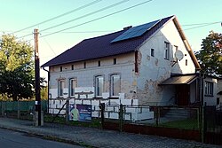 A historic building in Kuźnia Raciborska, Poland, during the implementation of thermal insulation leading to the destruction of the original facade