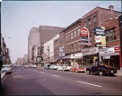 Canada Trust was founded in London in 1864 as The Huron and Erie Trust. Its headquarters is visible in this 1960 photo. The successor bank is TD Canada Trust, with the first transit number assigned to TD: 0001.[38][39]