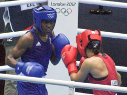 Nicola Adams (left), the first female boxer to win an Olympic gold medal, with Mary Kom of India