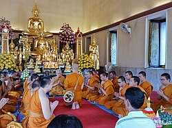 An ordination ceremony at Wat Yannawa in Bangkok. The Vinaya codes regulate the various sangha acts, including ordination.