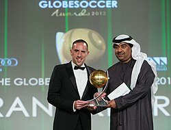 Ribéry collecting the Globe Soccer Awards Best Player of the Year award in 2013