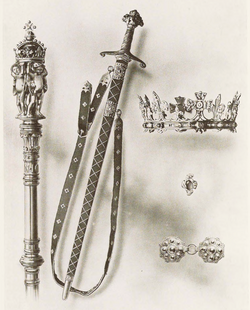 The Honours created in 1911 for the investiture of Edward, Prince of Wales (later Edward VIII). Clockwise from left: Rod (or verge), sword, circlet (or chaplet), ring and clasp.[1]