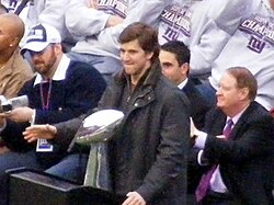 Manning with the Lombardi Trophy during the Giants Super Bowl victory rally at Giants Stadium in 2008.