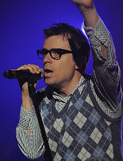 Cuomo performing with Weezer in July 2010