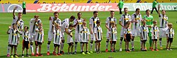 The team of the 2014–15 season before the home game against Bayer 04 Leverkusen on 9 May 2015.Left to right: Kruse; Wendt; Johnson; Xhaka; Raffael; Korb; Herrmann; Kramer; Brouwers; Sommer; and Jantschke.
