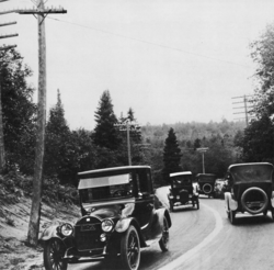 Dead Man's Curve along the Marquette–Negaunee Road shown in 1917 with its hand-painted centerline, the first in the nation