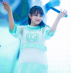Kim performing in 2016