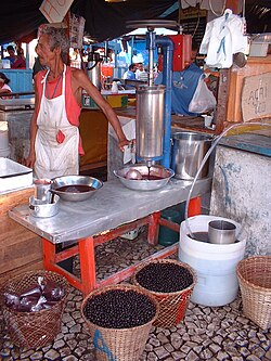 Street vendor of açaí, next to Ver-o-Peso market in Belém