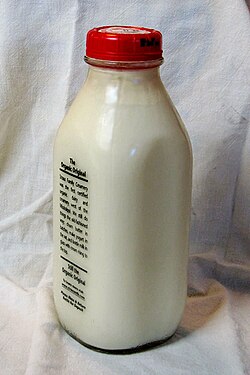 A glass bottle of non-homogenized, organic, local milk from the US state of California. American milk bottles are generally rectangular in shape.[citation needed]