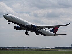 A Delta Air Lines Airbus A330-323 taking off at Amsterdam Schiphol Airport in July 2017