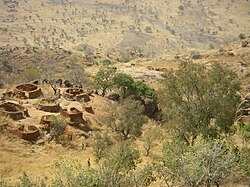 An abandoned village in the Nuba Mountains from the previous civil war. Villagers moved up in the mountains to avoid the militias.