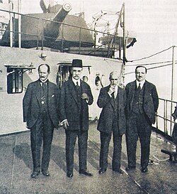 The Ottoman delegation at Sèvres: Left to right: Rıza Tevfik Bölükbaşı, Grand Vizier Damat Ferid Pasha (wearing fez), minister of finance Mehmet Tevfik Biren, and ambassador Reşat Halis