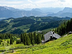 The Bavarian Alps (foreground) and Tyrol in Austria (background), including the Inn valley (center), Kaisergebirge (left), Pendling (right), and the snow-capped High Tauern (center left)