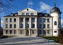 Former Kaiser Wilhelm Institute for Chemistry building in Berlin. Heavily damaged by bombing during the Second World War, it was restored and became part of the Free University of Berlin. It was renamed the Otto Hahn Building in 1956, and the Hahn-Meitner Building in 2010.[26][27]